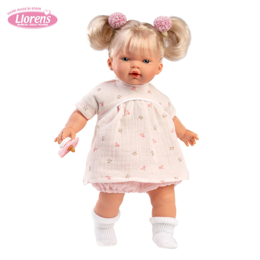 Слика на Кукла Roberta со фустанче со кратки ракави и цветни детали, 33 cm (плаче, вели мама и папа)  – Llorens Dolls